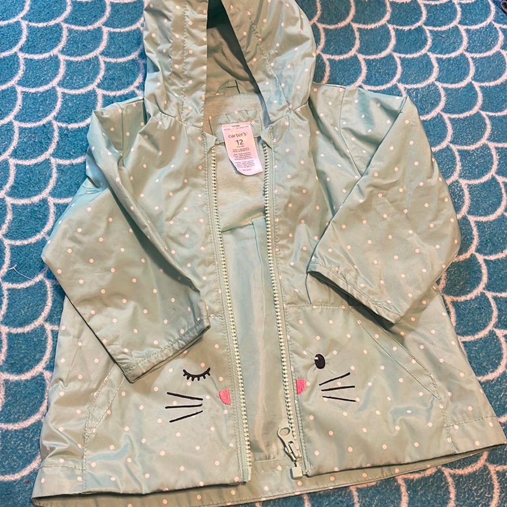Carter 12 mo bunny raincoat in good condition.